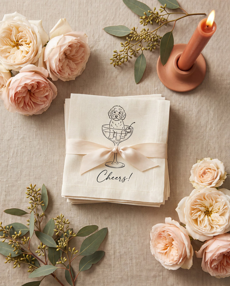 Personalized pet cocktail napkins styled with florals for bridal shower