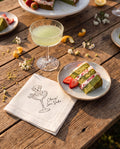 Custom pet napkins styled with wedding dessert table